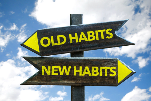 old-habits-new-habits-signpost-with-sky-background